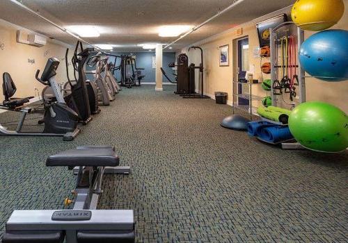 A gym with exercise equipment at 450 Green apartments for rent in Norristown, PA